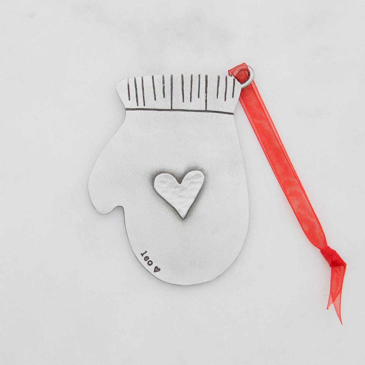 found mitten ornament hand-molded and cast in fine pewter and personalized with a special name