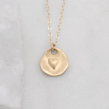 10k yellow gold full of love necklace strung on gold-filled link chain