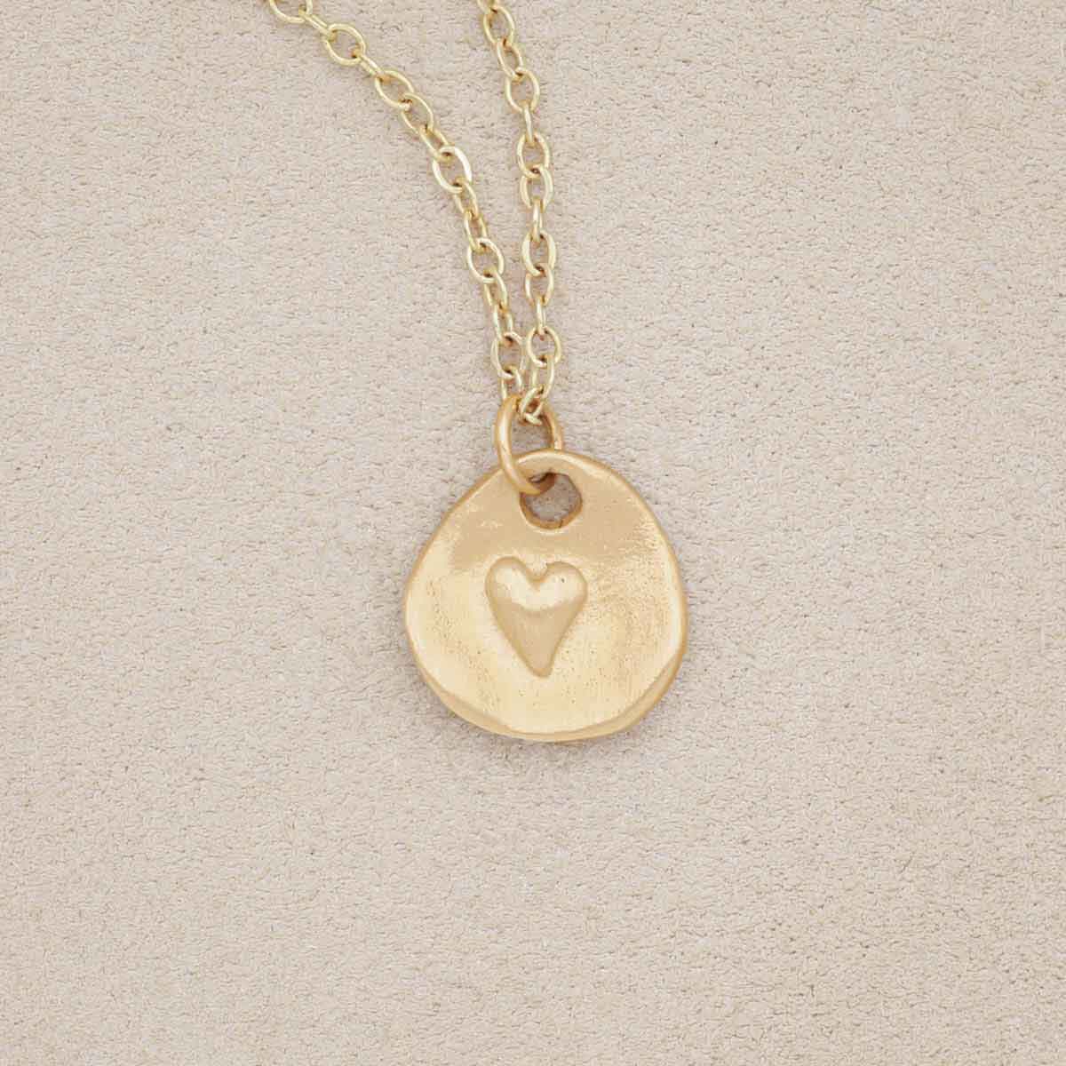 10k yellow gold full of love necklace strung on gold-filled link chain