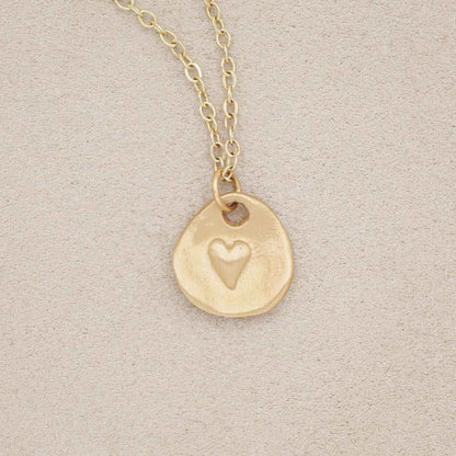 14k yellow gold full of love necklace strung on gold-filled link chain