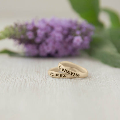 furry footprint 14k yellow gold stacking rings personalized with pet names