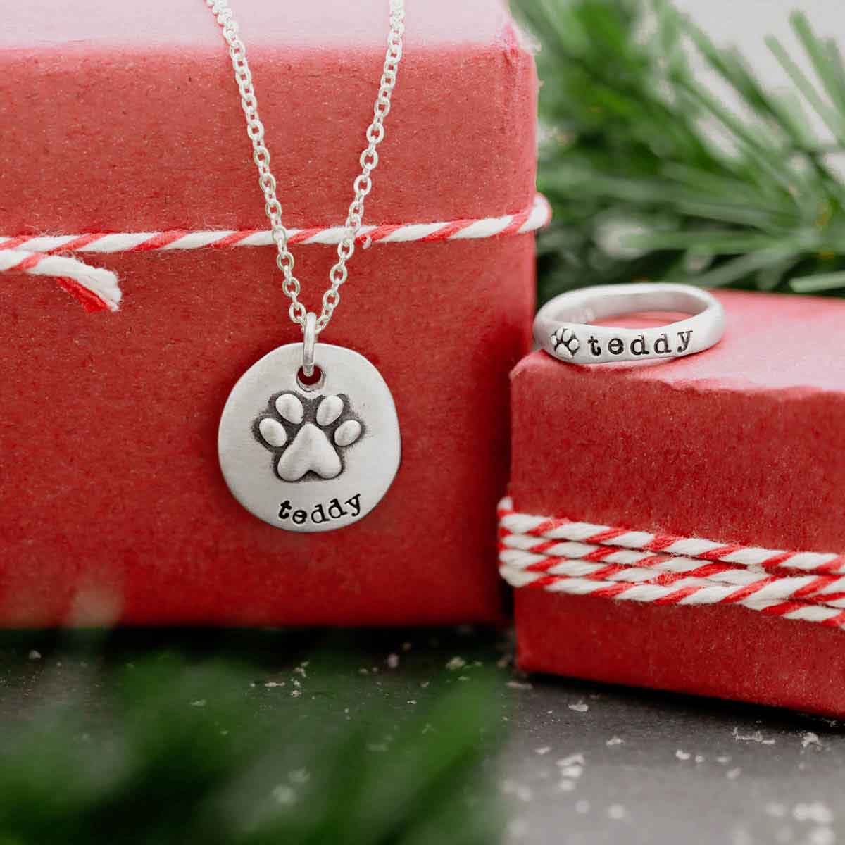 furry footprint sterling silver stacking ring and necklace personalized with pet names