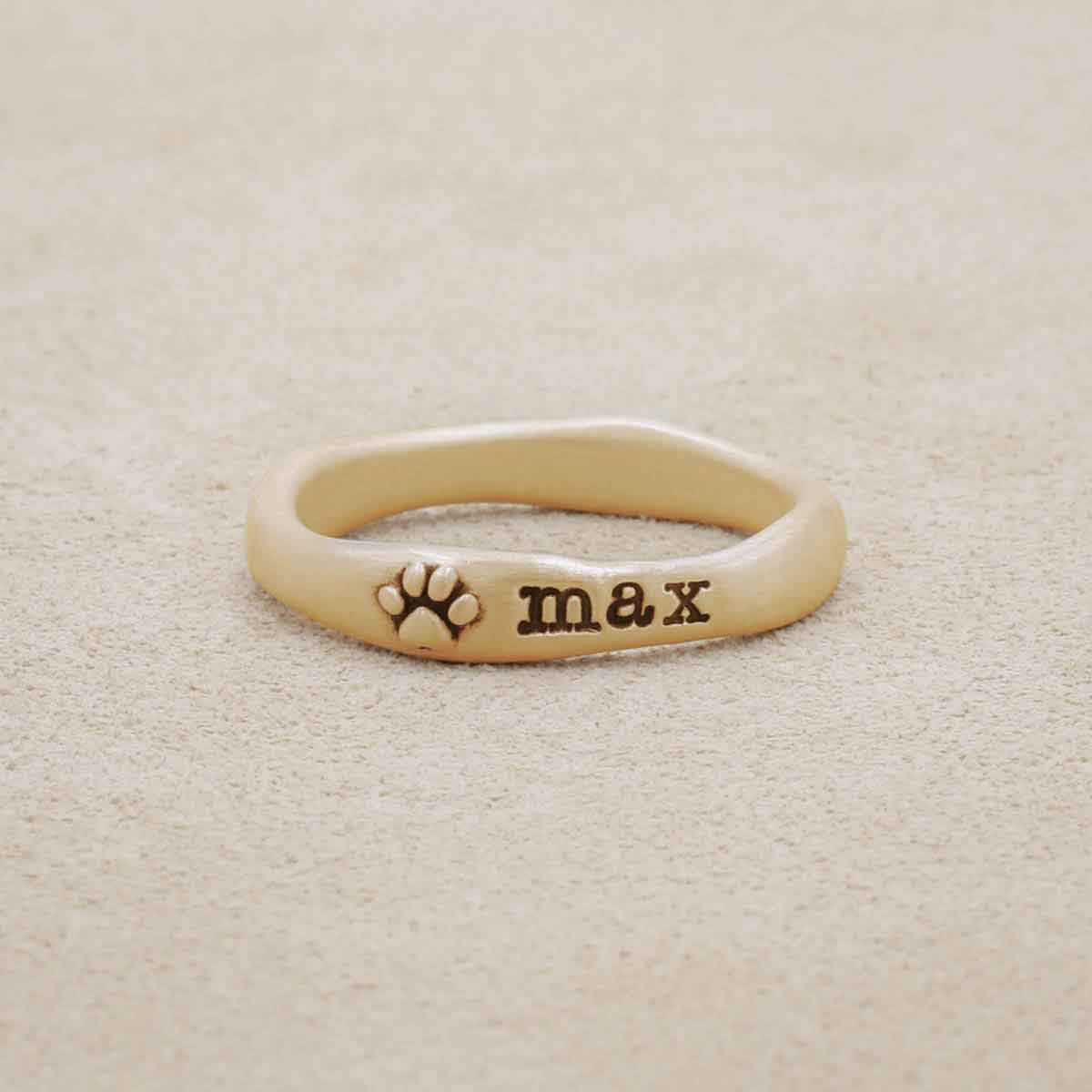 furry footprint 10k yellow gold stacking rings personalized with pet names