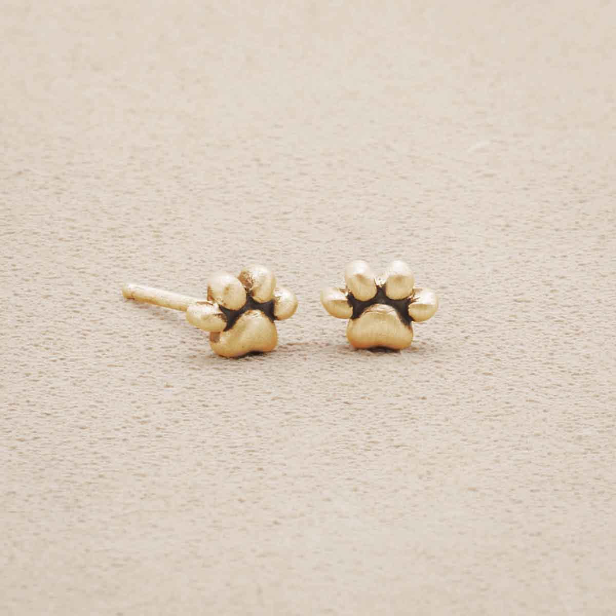 Furry Footprint Stud Earrings, handcrafted in 10k yellow gold