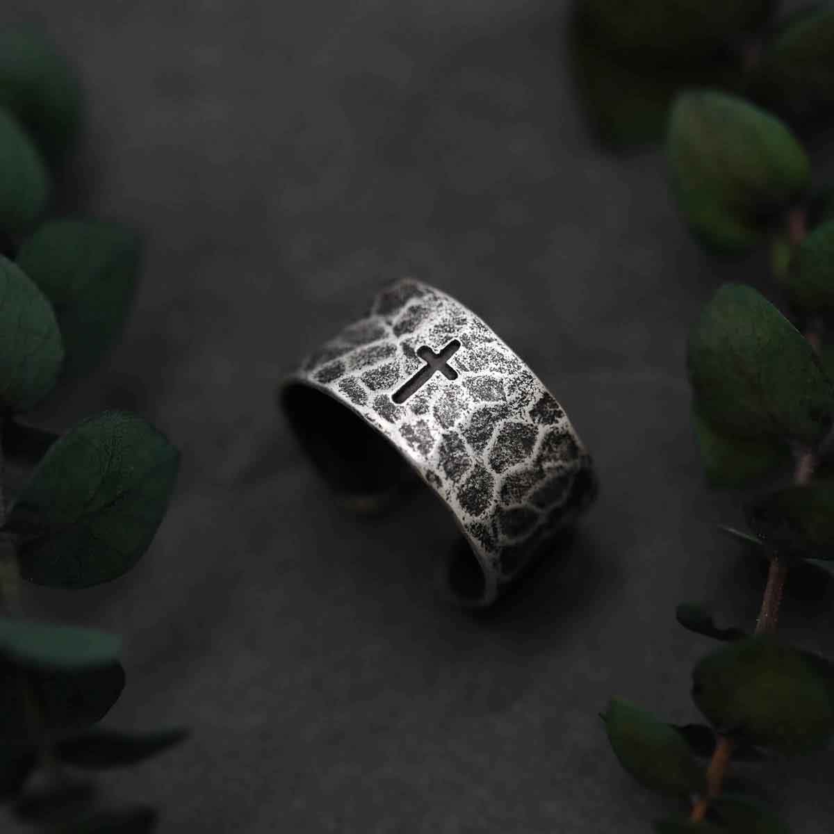 woman wearing a blackened sterling silver Hammered Cross Adjustable Ring