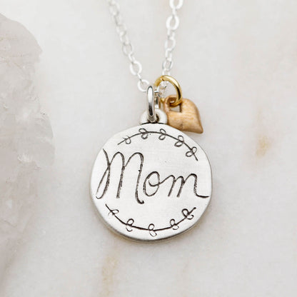 Heart to Heart mom necklace handcrafted in sterling silver engraved and attached with a bronze heart charm