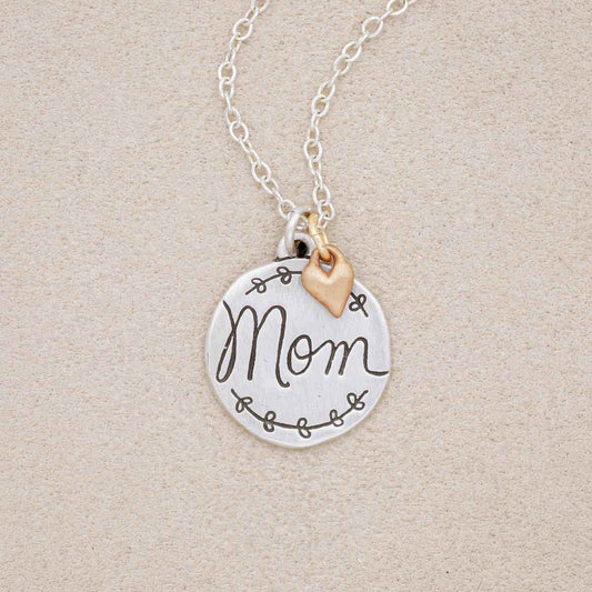 Heart to Heart mom necklace handcrafted in sterling silver engraved and attached with a bronze heart charm