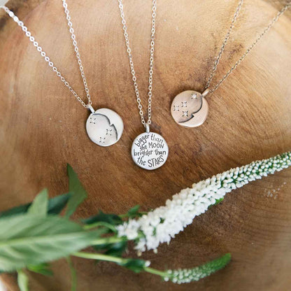 I love you moon and stars necklace handcrafted in sterling silver and set with up to 7 crystal stones the size of 2mm and engraved on the back