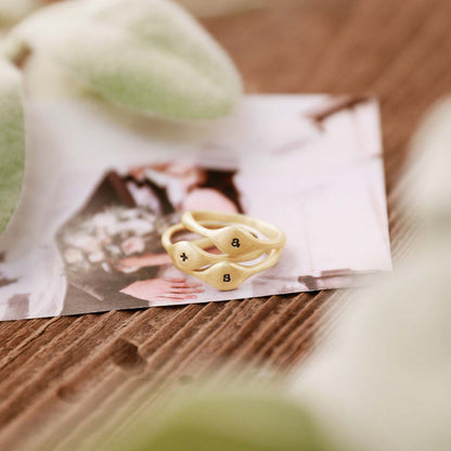 Initial stacking ring handcrafted and cast in 10k yellow gold then hand-stamped with an initial 