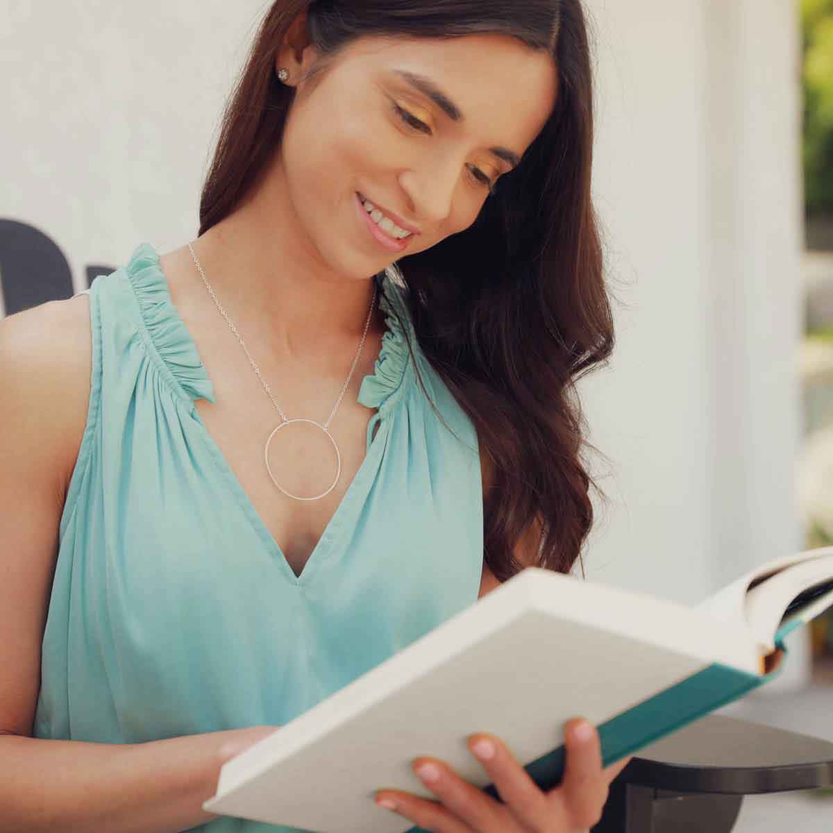 woman wearing a sterling silver It All Matters Circle Necklace