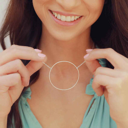 woman wearing a sterling silver It All Matters Circle Necklace