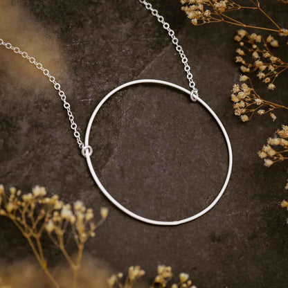 woman wearing a sterling silver It All Matters Circle Necklace