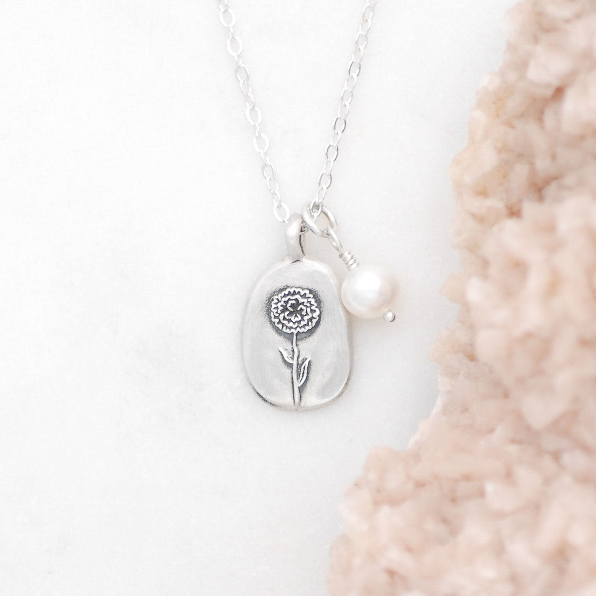 January birth flower necklace handcrafted in sterling silver with a special birth month charm strung with a vintage freshwater pearl