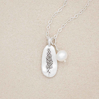 July birth flower necklace handcrafted in sterling silver with a special birth month charm strung with a vintage freshwater pearl