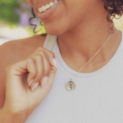 girl wearing a pewter June Birth Flower Necklace with 18" link chain