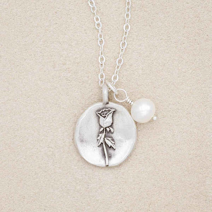 June birth flower necklace handcrafted in sterling silver with a special birth month charm strung with a vintage freshwater pearl