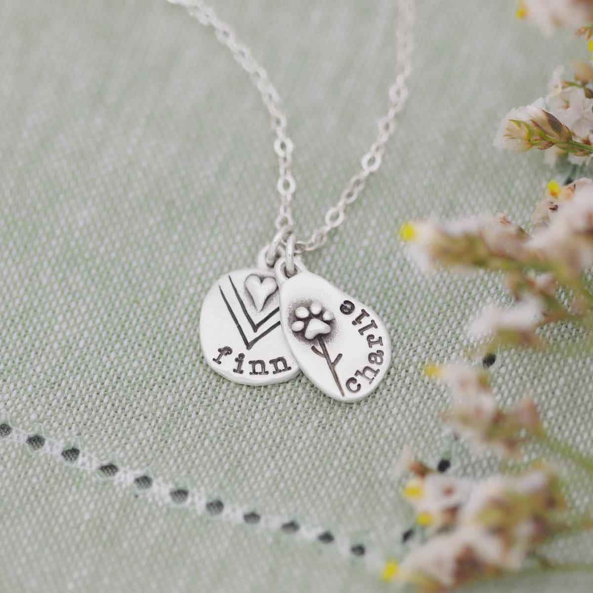 Woman wearing a Personalized jumble of love necklace sterling silver