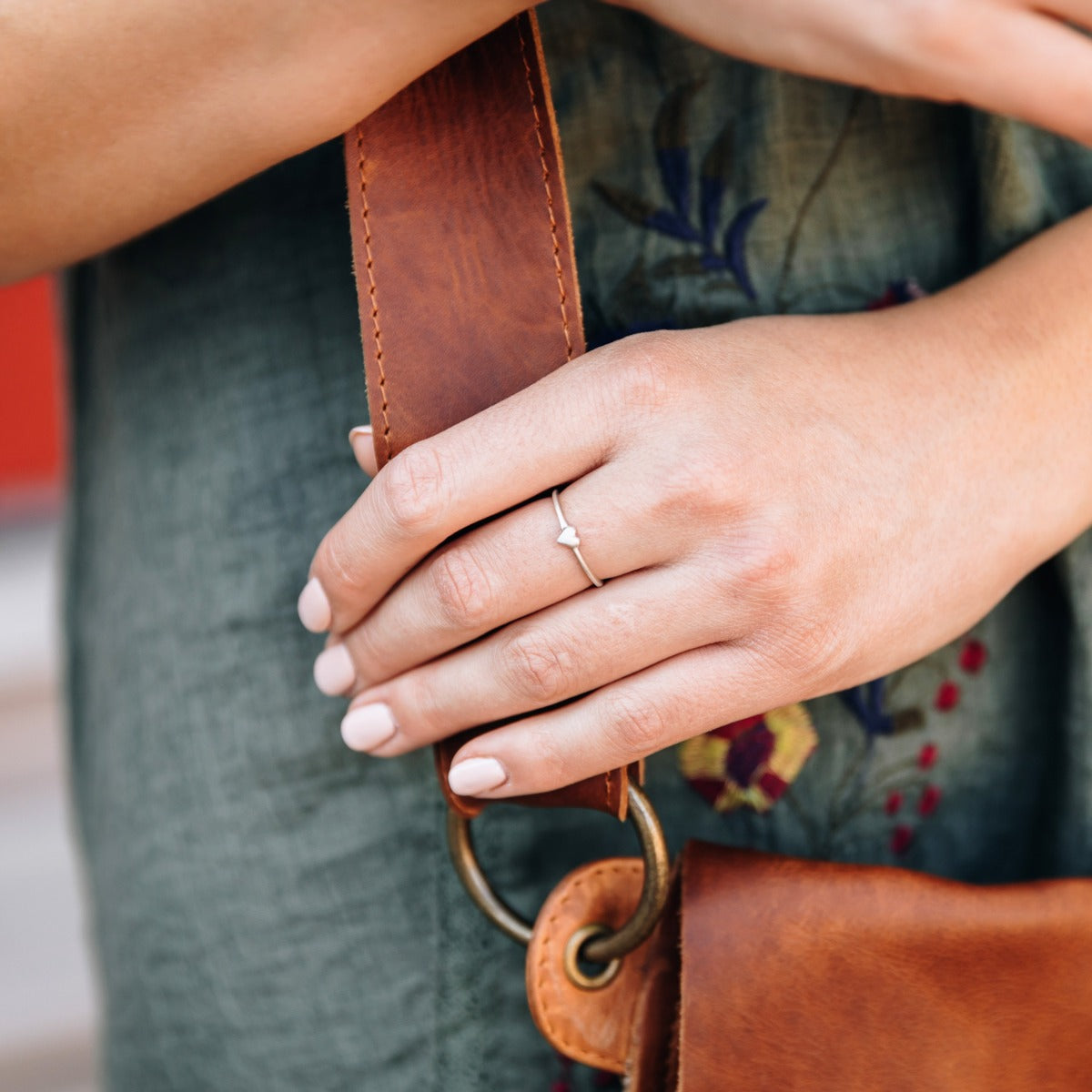 girl wearing a sterling silver sweet love ring - one heart  