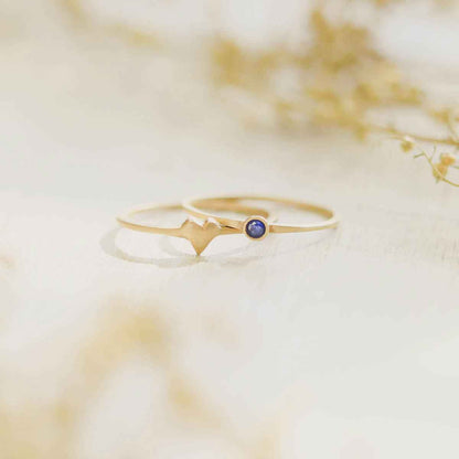 love and loss ring pair hand-molded and cast in 14k yellow gold including finespun birthstone ring and sweet love ring