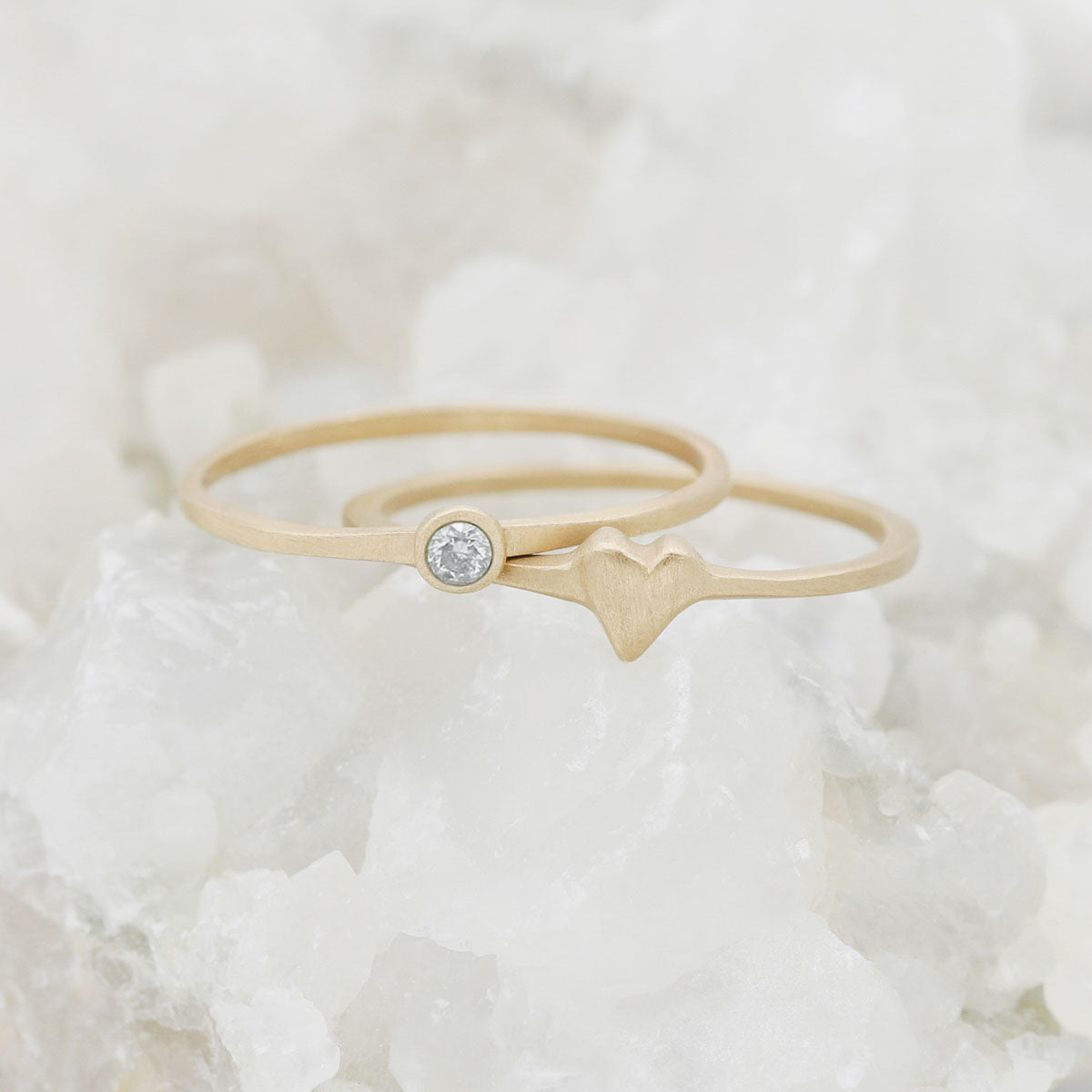 love and loss ring pair hand-molded and cast in 14k yellow gold including finespun birthstone ring and sweet love ring