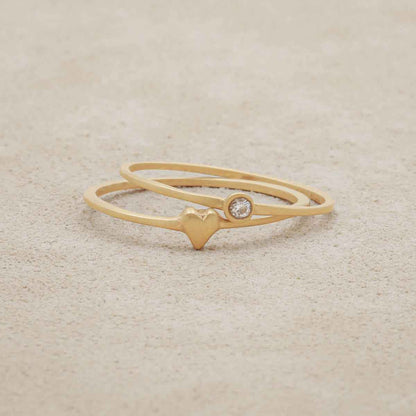 love and loss ring pair hand-molded and cast in 14k yellow gold including finespun birthstone ring and sweet love ring