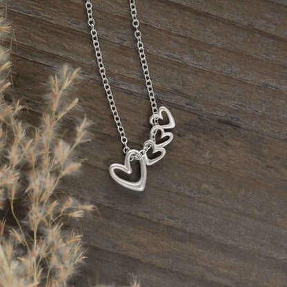 Love Grows necklace handcrafted in sterling silver with the heart charm sterling silver or 10k gold