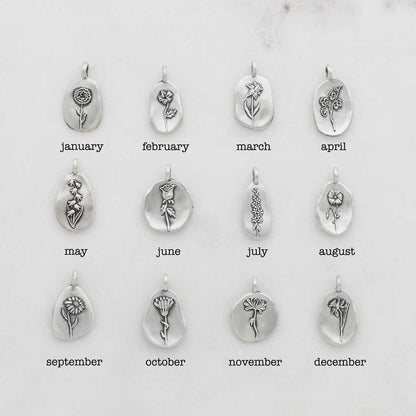 birth flower charms handcrafted in sterling silver with a special birth month charm strung with a vintage freshwater pearl