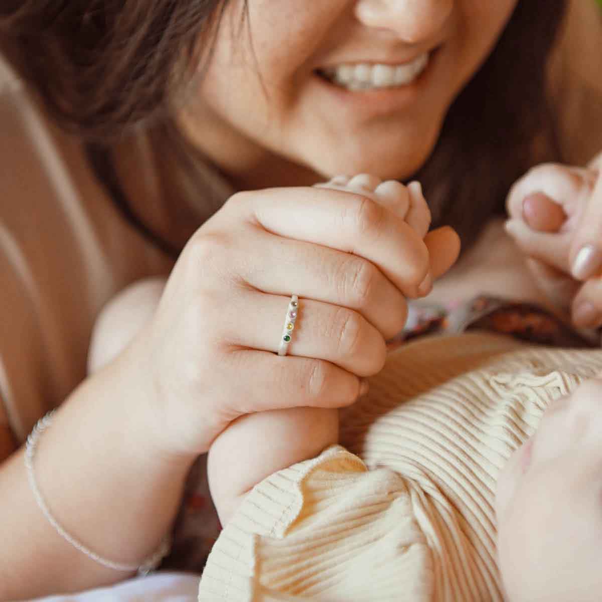 mom wearing sterling silver mother's birthstone ring