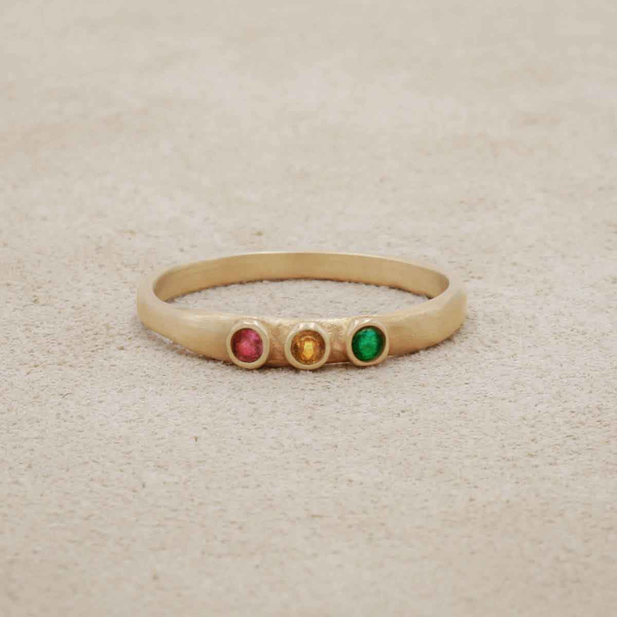 Handcrafted 14k yellow gold mother's rings customizable with up to 6 genuine birthstones