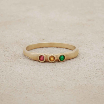 Handcrafted 14k yellow gold mother's rings customizable with up to 6 genuine birthstones