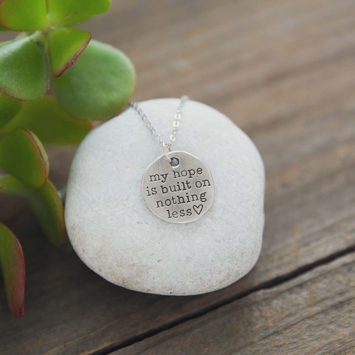 my hope is built pewter necklace on a rock