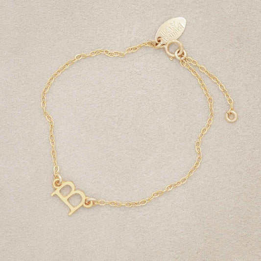 10k yellow gold monogram bracelet with a satin finish