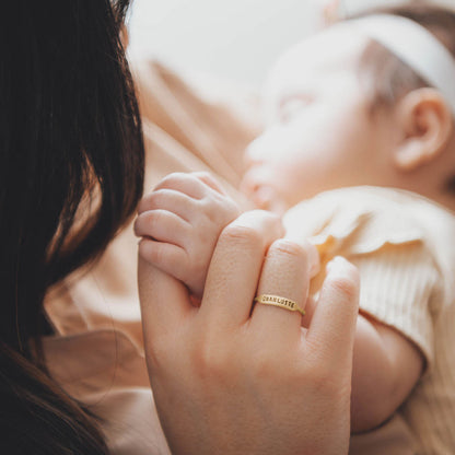 mom wearing 10k yellow gold personalized Nameplate Stacking Ring