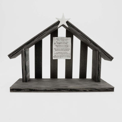 handcrafted wooden nativity stable  that includes a pewter star and a hand-stamped poem