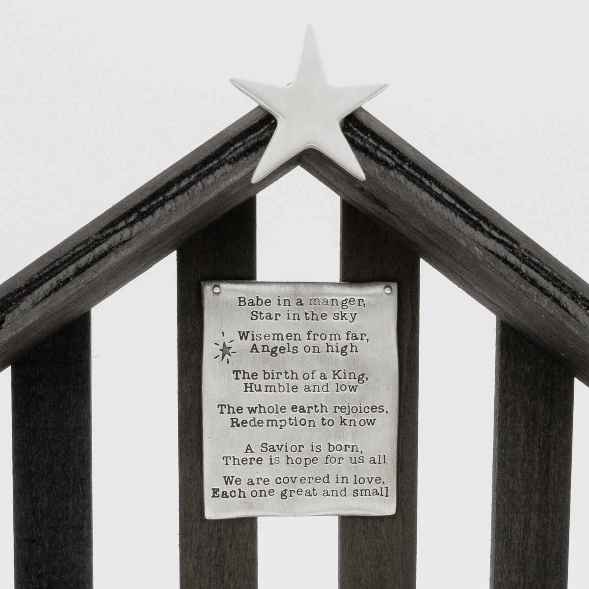 handcrafted wooden nativity stable  that includes a pewter star and a hand-stamped poem