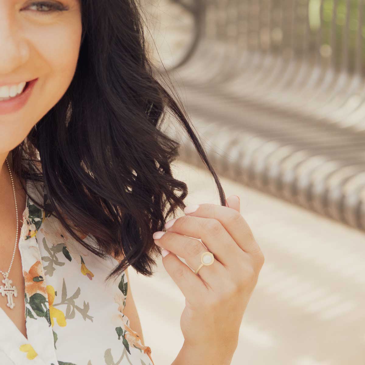 Girl wearing Nesting freshwater large pearl ring hand cast in 14k yellow gold holding inside a large 6mm freshwater pearl 