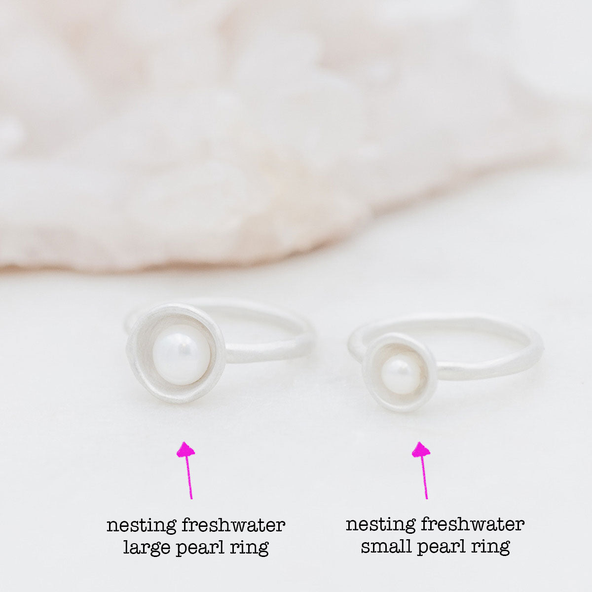 Nesting freshwater large pearl ring hand cast in sterling silver holding inside a large 6mm freshwater pearl 