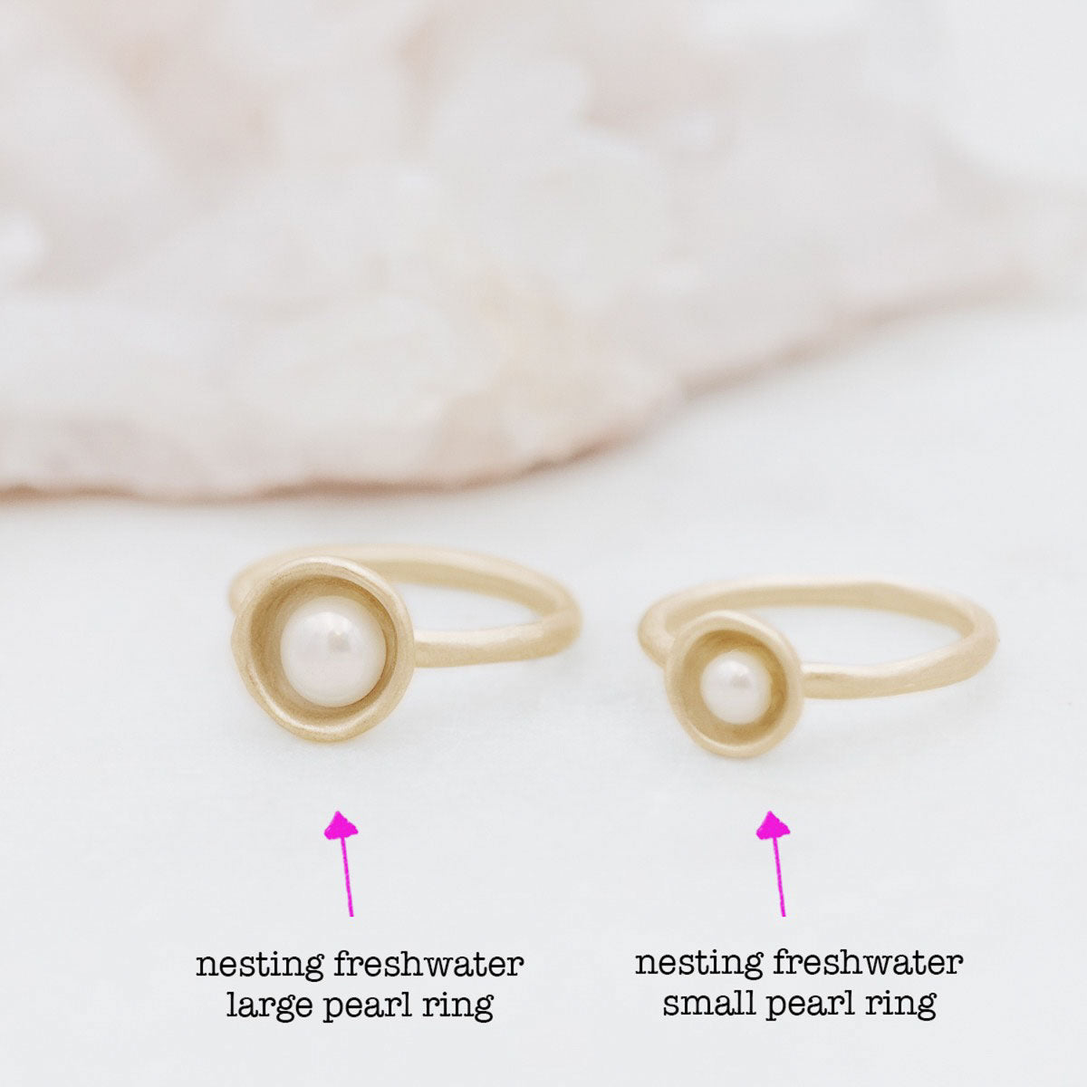 Nesting freshwater small pearl ring hand cast in 10k yellow gold holding inside a small 4mm freshwater pearl 