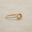 Nesting freshwater small pearl ring hand cast in 10k yellow gold holding inside a small 4mm freshwater pearl