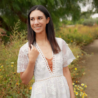 Woman holding her gold filled New Moon Necklace