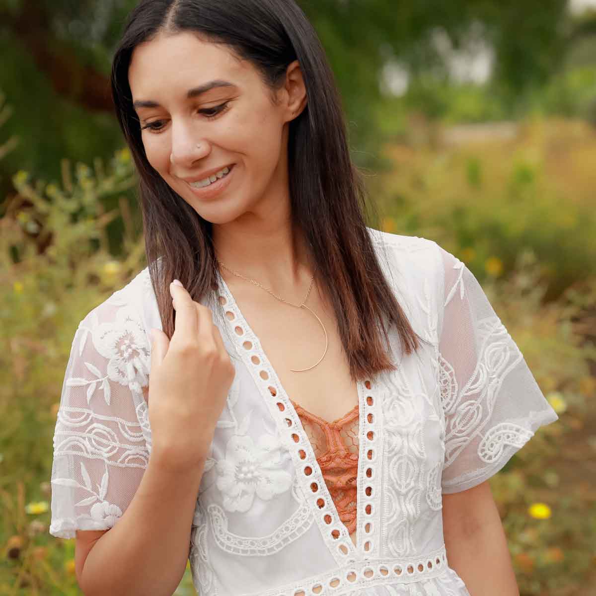 Woman wearing a gold filled New Moon Necklace