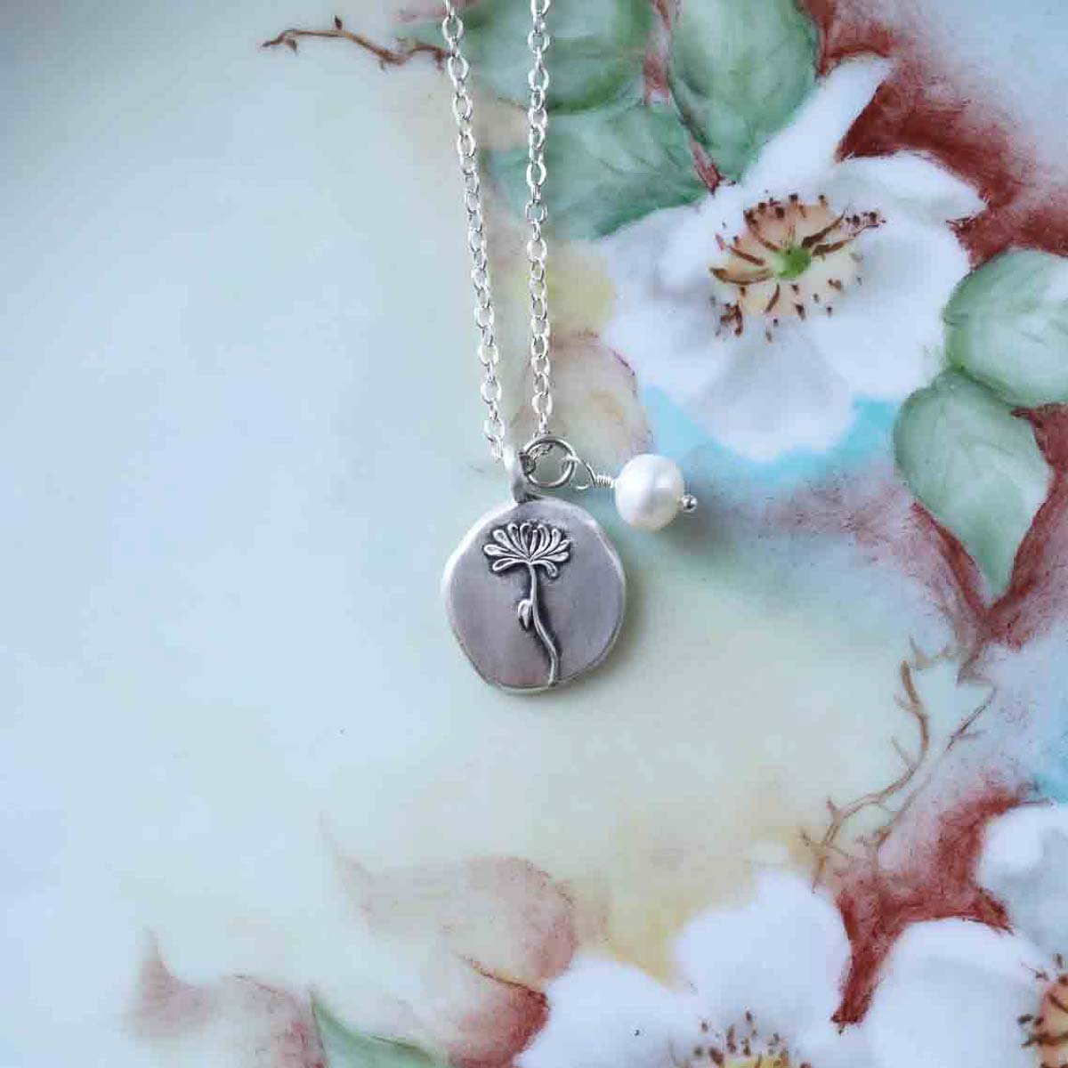 November birth flower necklace handcrafted in sterling silver with a special birth month charm strung with a vintage freshwater pearl