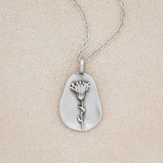 pewter October Birth Flower necklace with 18" link chain, on beige background