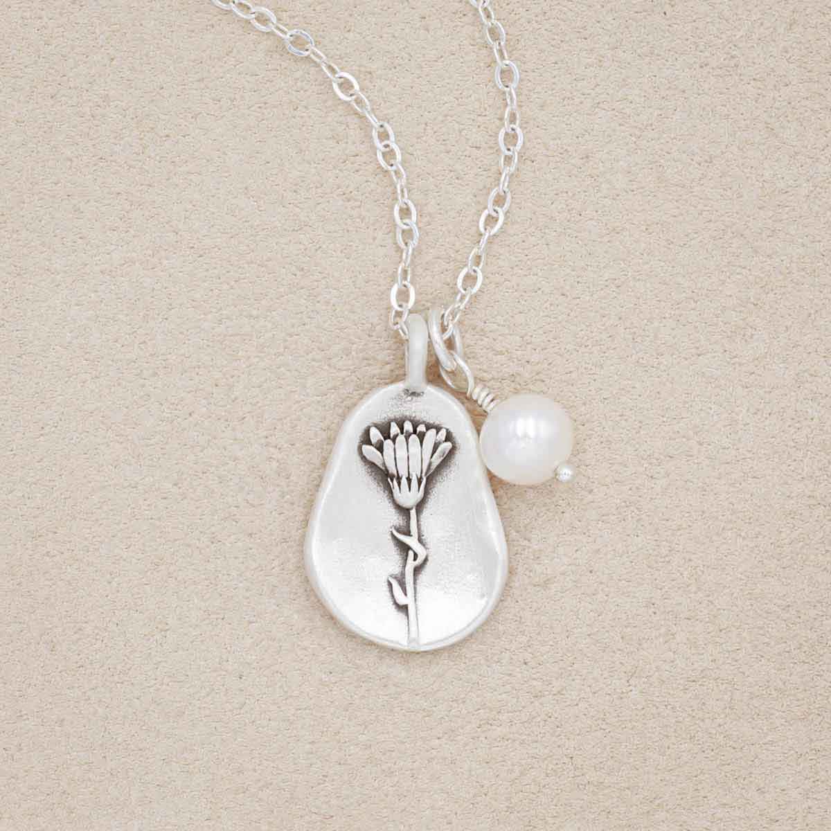 October birth flower necklace handcrafted in sterling silver with a special birth month charm strung with a vintage freshwater pearl