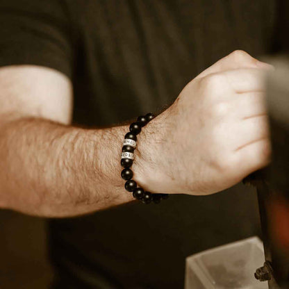 Man wearing a Black Onyx Beaded Name Bracelet