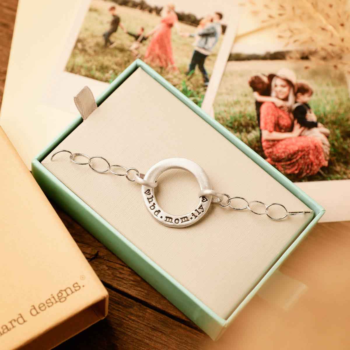 personalized sterling silver open circle pearl bracelet in a lisa leonard jewelry box