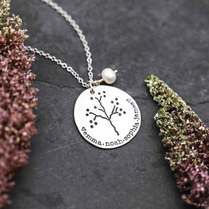 mother wearing the sterling silver original family tree necklace