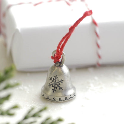 our Christmas tradition advent ornament set handcrafted and cast in fine pewter with 1 of the 24 on display