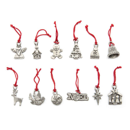 our Christmas tradition advent ornament set handcrafted and cast in fine pewter and includes all 24 ornaments in individual numbered bags