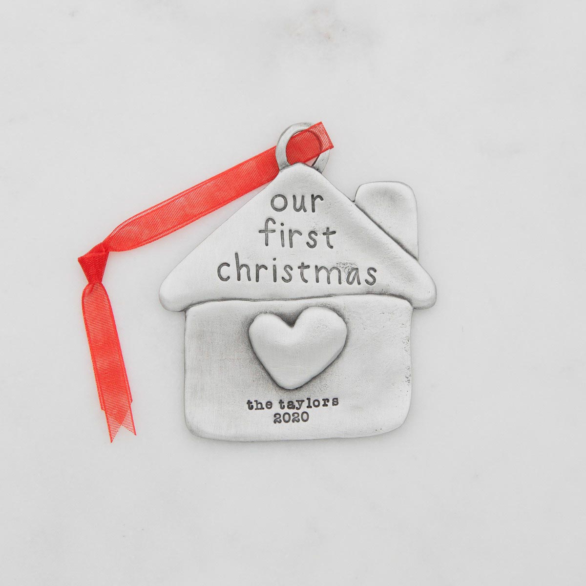 our first Christmas ornament hand-molded and cast in fine pewter and personalized with up to 2 lines of a meaningful message